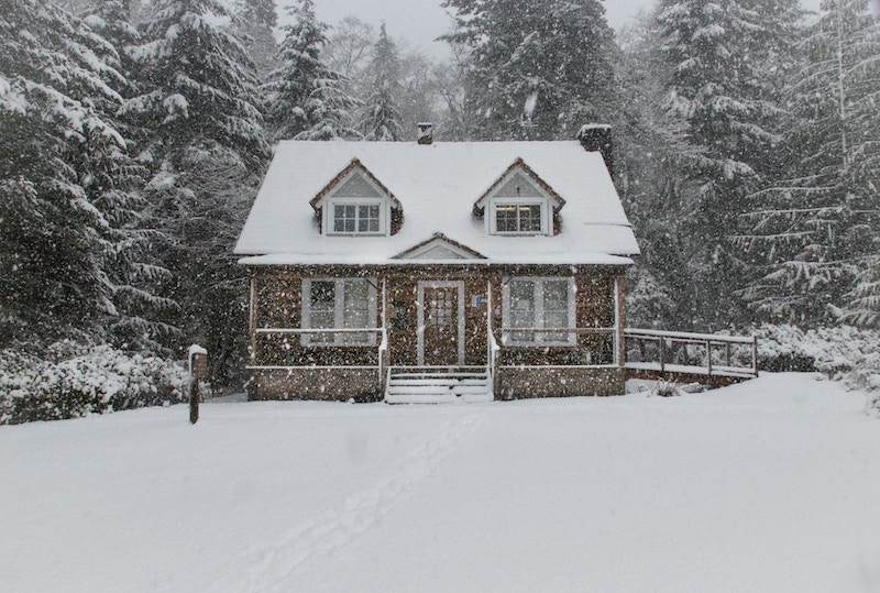home in the winter snow