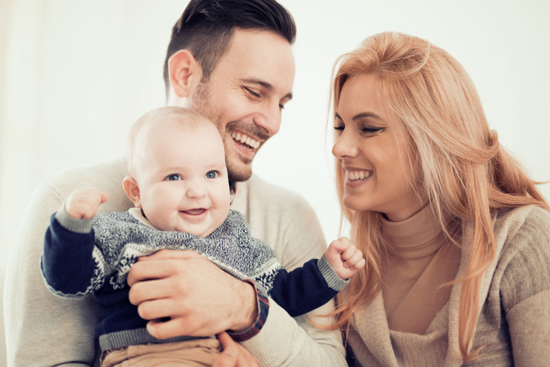 a family with a young baby